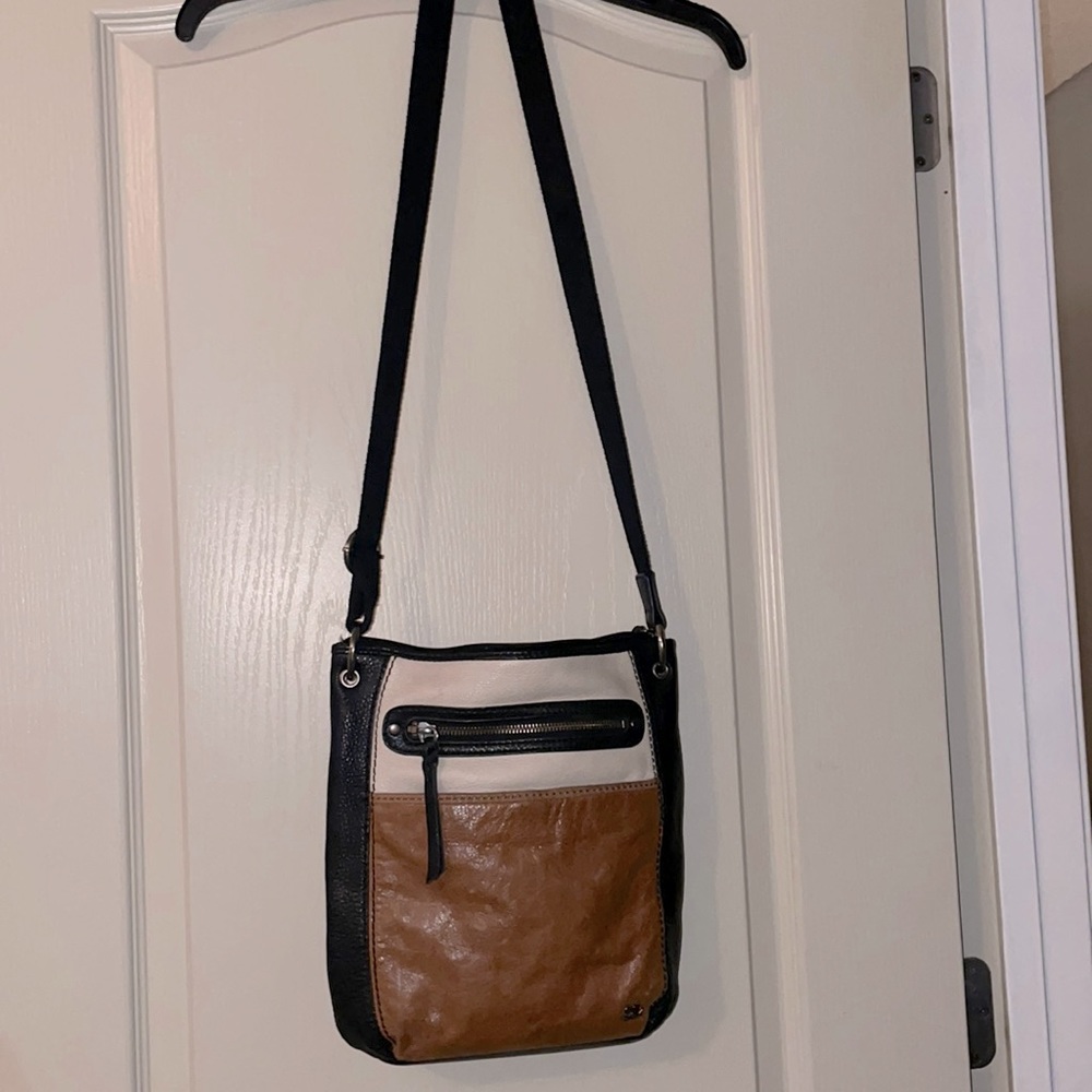 The Sak Crossbody Handbag 12 1/2 inches wide by 12 1/2 inches long. Minor scuffs